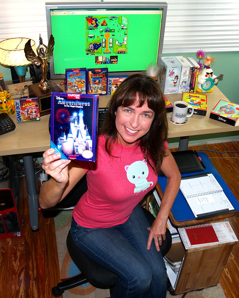Darlene Lacey in her home office in 2015 with some of the classic computer games she created.